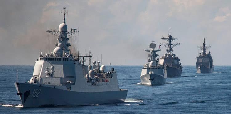 China conducts air, sea patrols near flashpoint reef