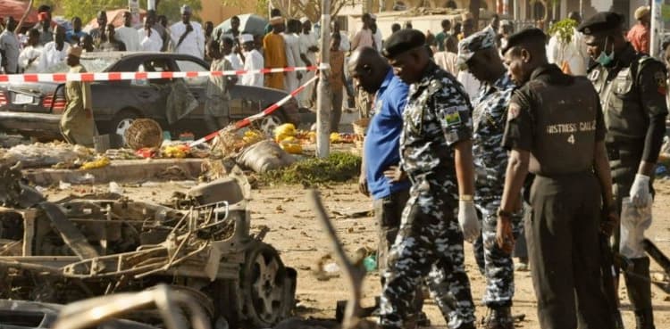 At least 113 people killed in central Nigeria attacks