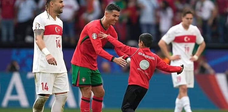 Euro 2024: Young fan invades pitch, takes selfie with Cristiano Ronaldo