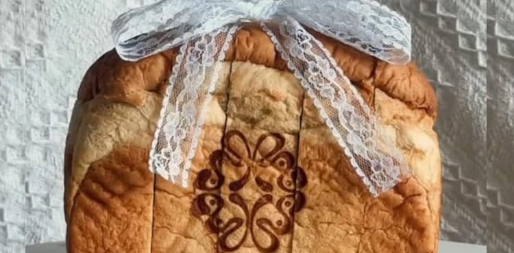 Couple sends loaf of bread as wedding invitation
