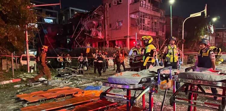 Iran launches missile barrage as Israel strikes Tehran