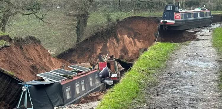 Houseboat swallowed by sinkhole opening on canal