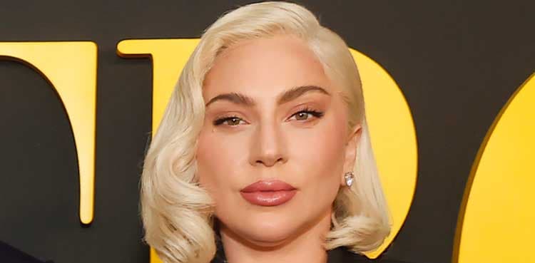 Lady Gaga assists photographer at 'The Devil Wears Prada 2' red carpet