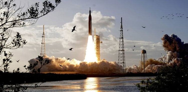 Russia delays lunar missions as US marks historic flight