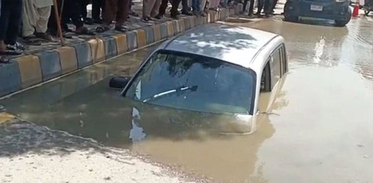 Viral Video: Sinkhole swallows moving car with women inside in Karachi