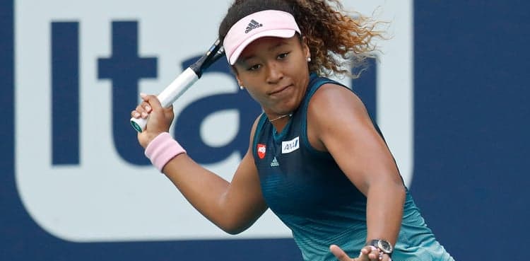 Williams loses in Germany, Osaka eases through