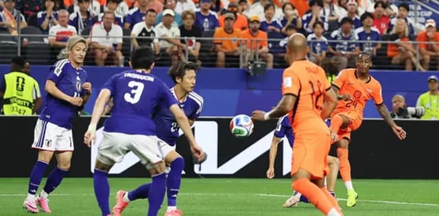 Japan snatch draw with Netherlands