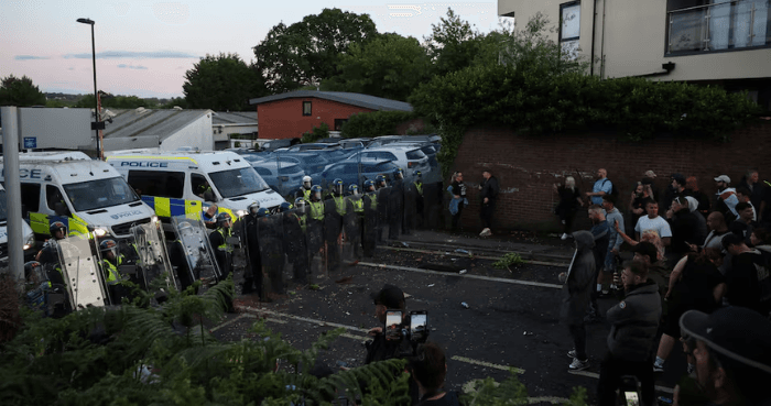 UK police under pressure after dying student was handcuffed