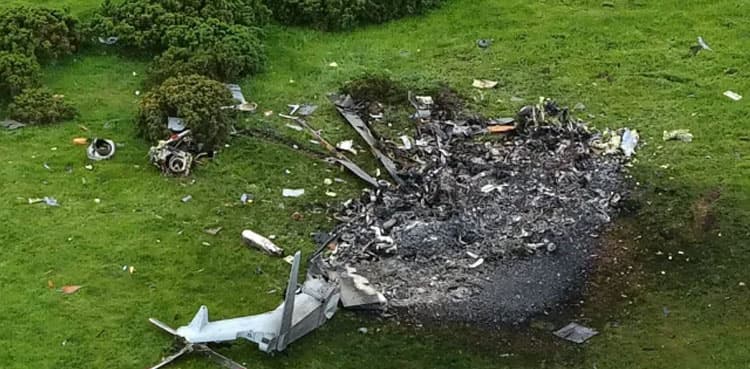 Three dead after Royal Navy helicopter crashes into a field in Devon