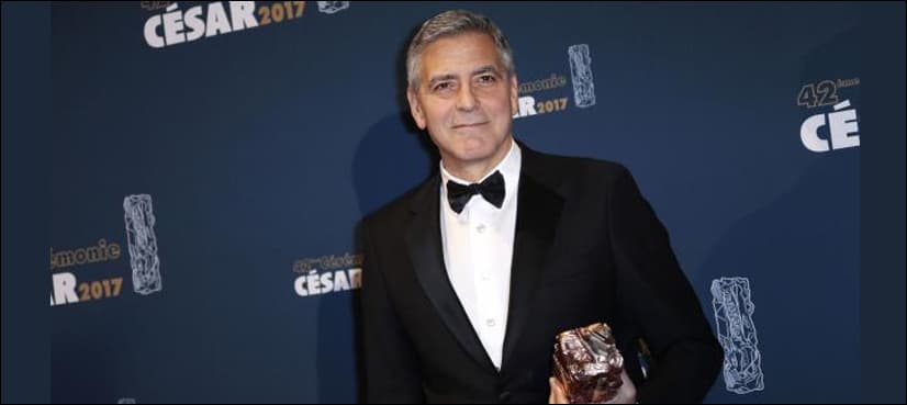 Clooney blasts Trump as Huppert's 'Elle' wins at 'French Oscars'