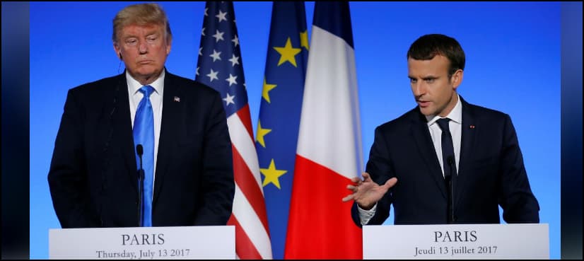 Smiles replace grimaces as Macron welcomes Trump to Paris
