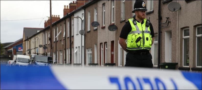 London police open fire in embassy car crash