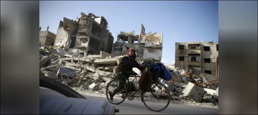 Syrians in Ghouta scramble for safety as bombing builds