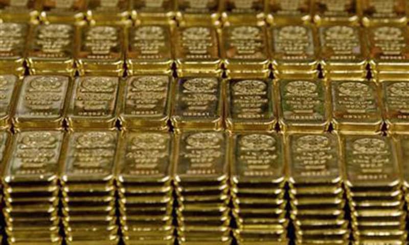 Gold retreats as dollar steady