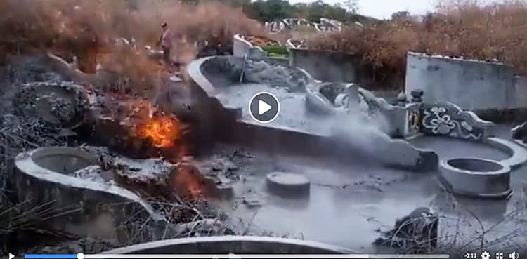 Is this a video of 'ghost fire' burning in a graveyard?