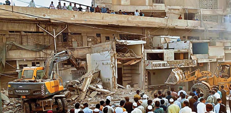 KMC demolishes illegal encroachments in Karachi's old city areas