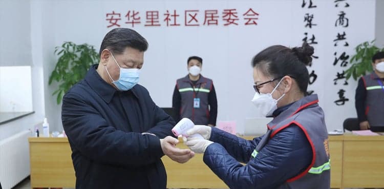 China president in rare visit to virus patients, medics