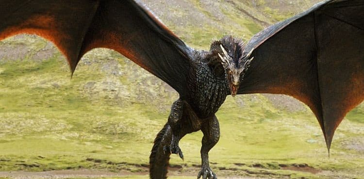 Baby dragons take their bow in a cave