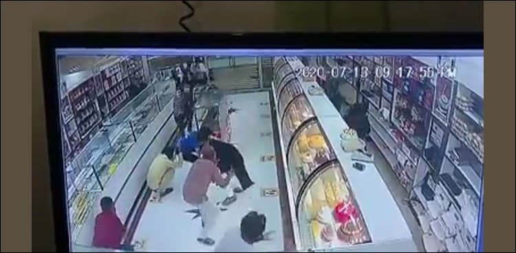 CCTV footage shows customers miraculously survive firing by robbers in Karachi