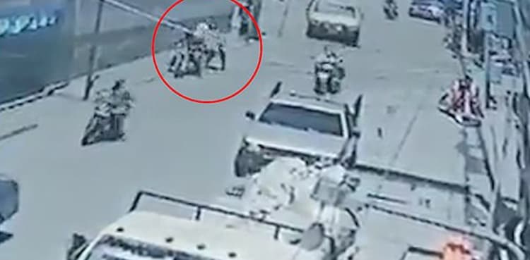 Terrifying footage: Child snatched from mother's arms on crowded road