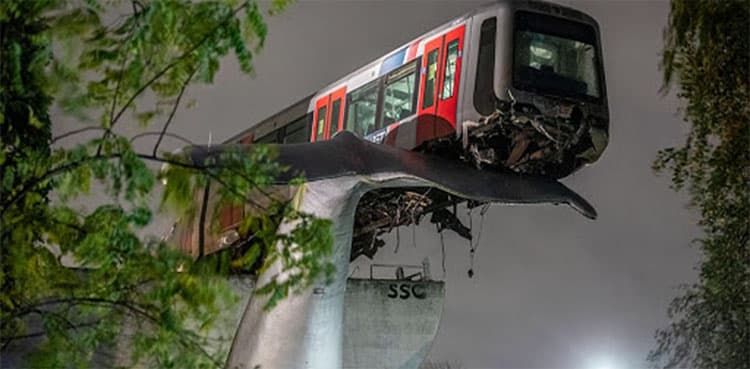 Train lands on Whale sculpture after crashing through barrier