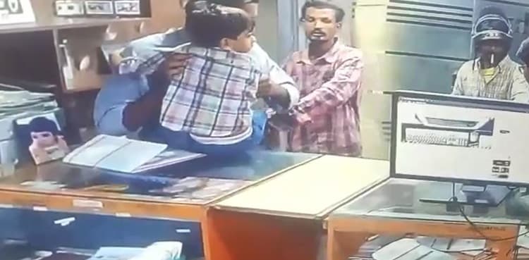Karachi police arrest 'waste collector' over armed robbery in photo studio