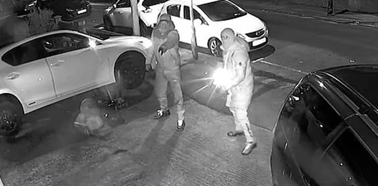 CCTV footage shows masked thieves stealing car's catalytic converter