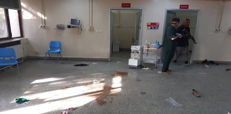 Dozens killed and wounded as blasts and gunfire hit Kabul hospital