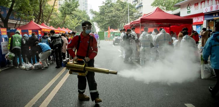 China's Covid cases rise as outbreak grows