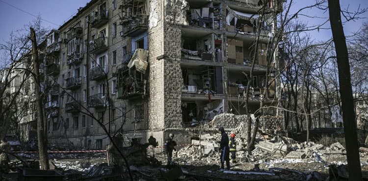 Russia accused of bombing school sheltering hundreds in Ukraine