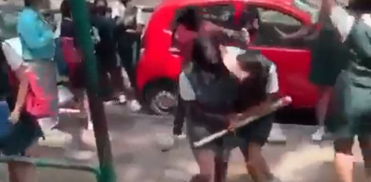 School girls rip each other's hair out in vicious brawl