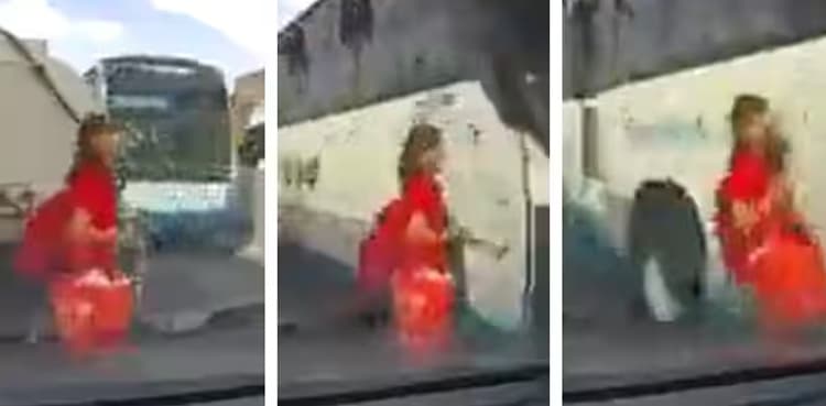 Video: Woman narrowly escapes death while crossing the road