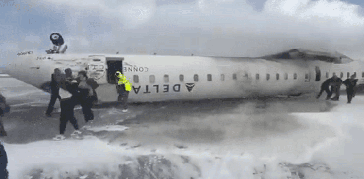 Delta plane flips upside down on landing at Toronto airport, injuring 18