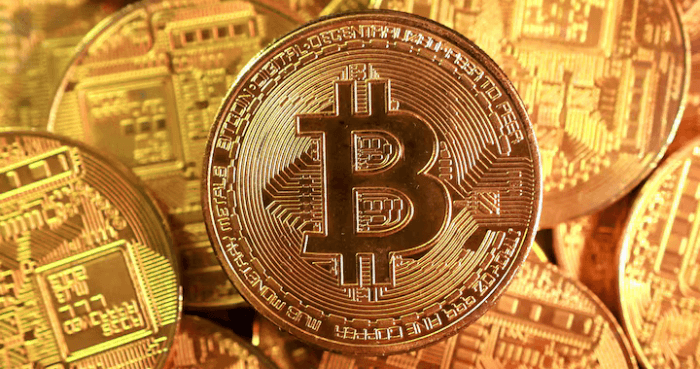 Bitcoin drops below $90,000 in sign of souring mood