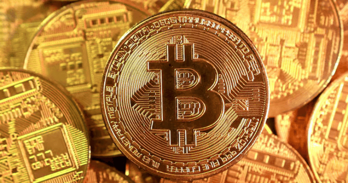 Bitcoin dips below $90,000 as AI worries dent risk appetite