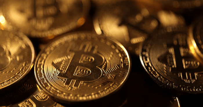 Bitcoin slumps with key $70,000 level in sight