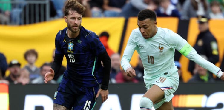Mbappe on target as France shrug off red card to beat Brazil