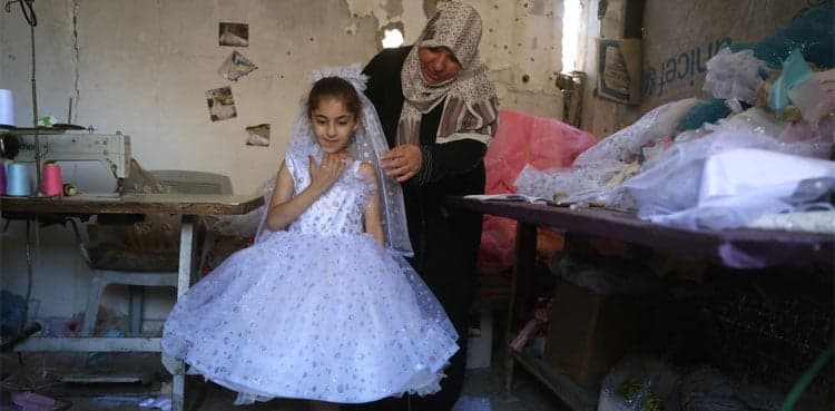 Gaza tailor turns waste fabrics into dresses for girls