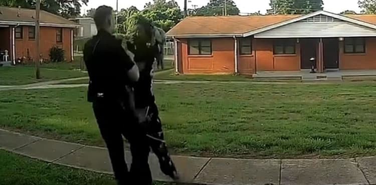 Police officer punches woman in viral arrest video