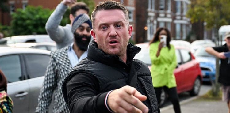 British anti-Islam activist Tommy Robinson held at Heathrow Airport
