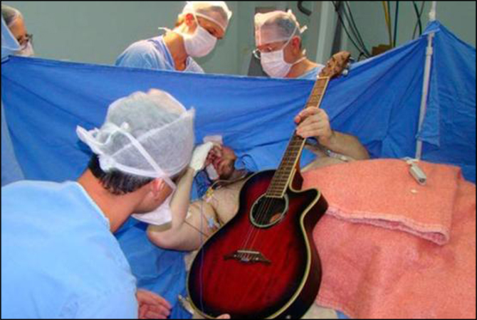 Man Plays Guitar During Brain Surgery In India To Help Doctors