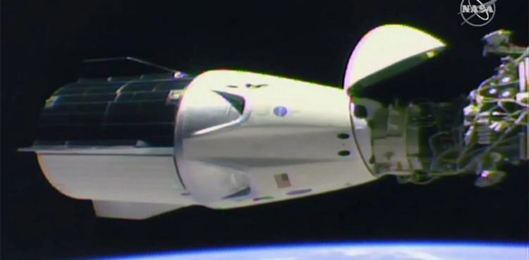 SpaceX dragon capsule docks with International Space Station