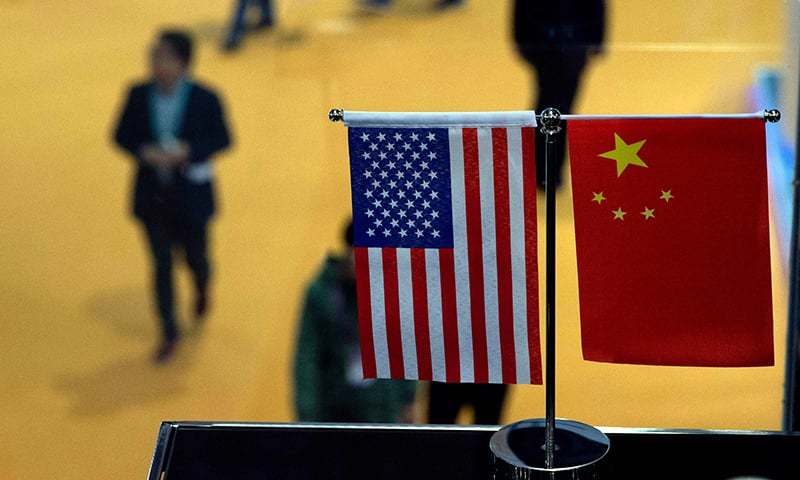 China to sanction US officials