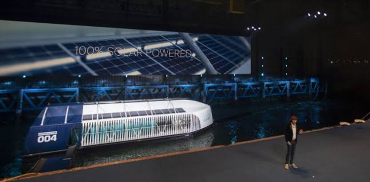 Dutch inventors The Interceptor river plastic clean-up barge