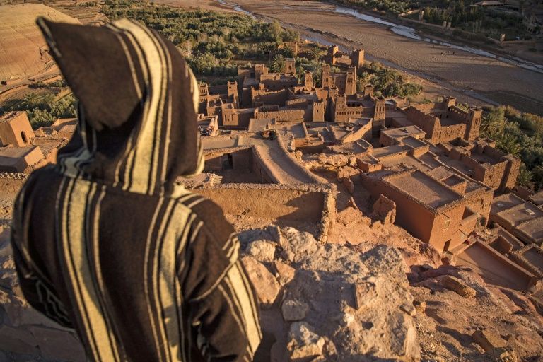 A man overlooks the fortified old city of Ait-Ben-Haddou. Photo: AFP