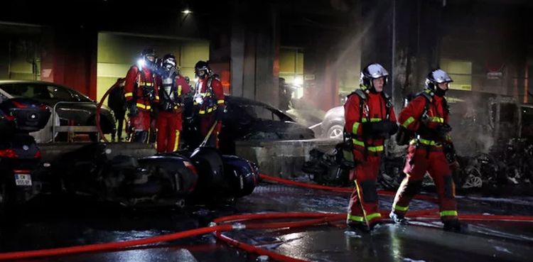 Paris fire train station protests