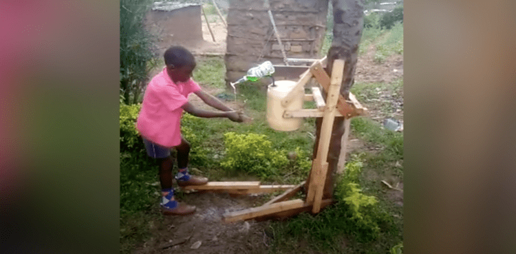 boy kenya hand-washing machine