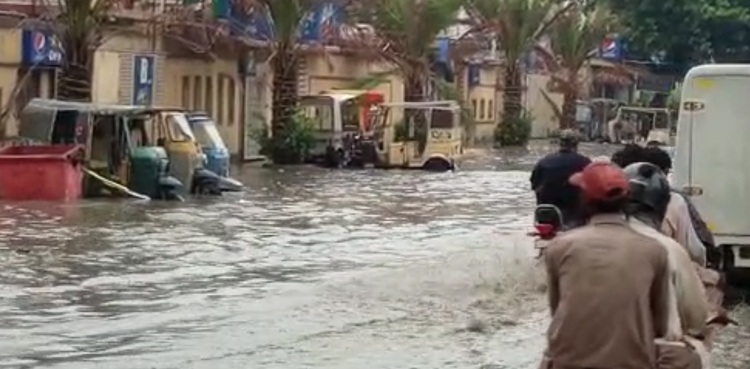 Karachi heavy rain urban flooding power outage