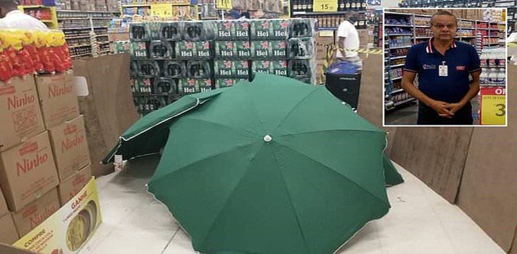 worker dead brazil covered umbrellas