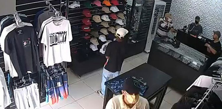 shopkeeper shoots robber brazil